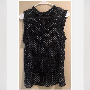 Black sheer blouse with white polka dots.size large.